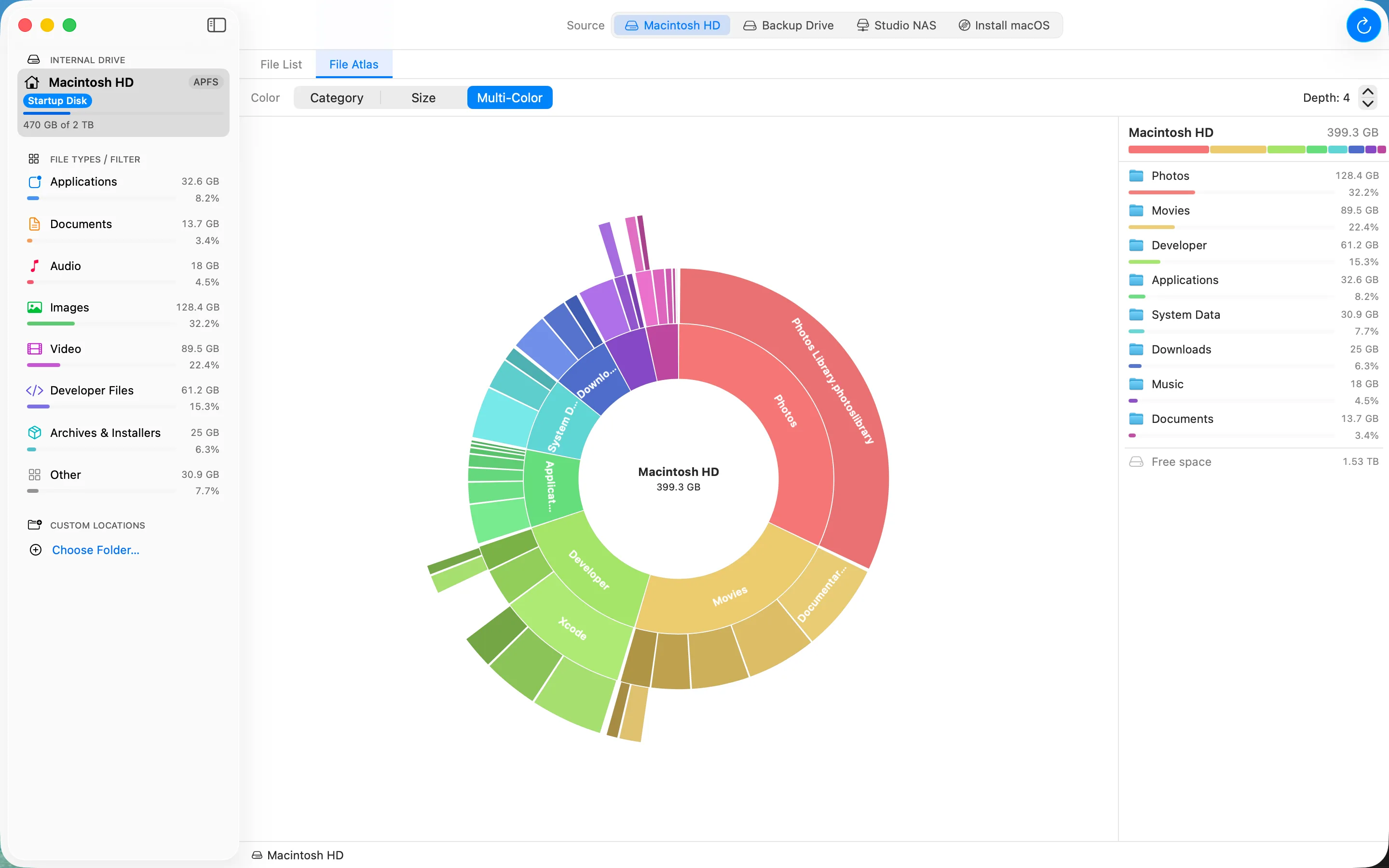 The File Atlas view: a sunburst chart of a drive with a size-ranked breakdown panel.