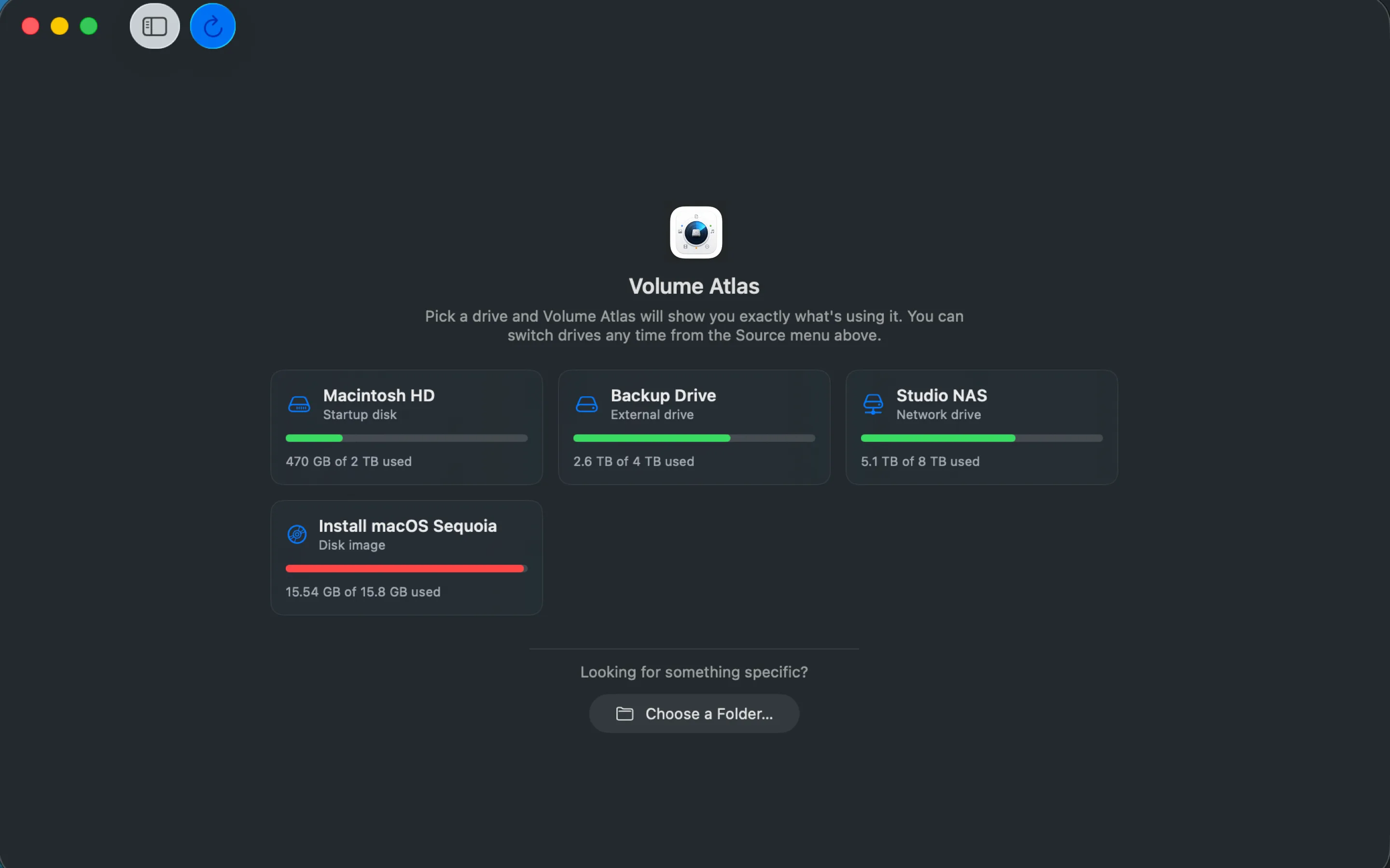 The drive picker: cards for the startup disk, an external drive, a network drive, and a disk image.