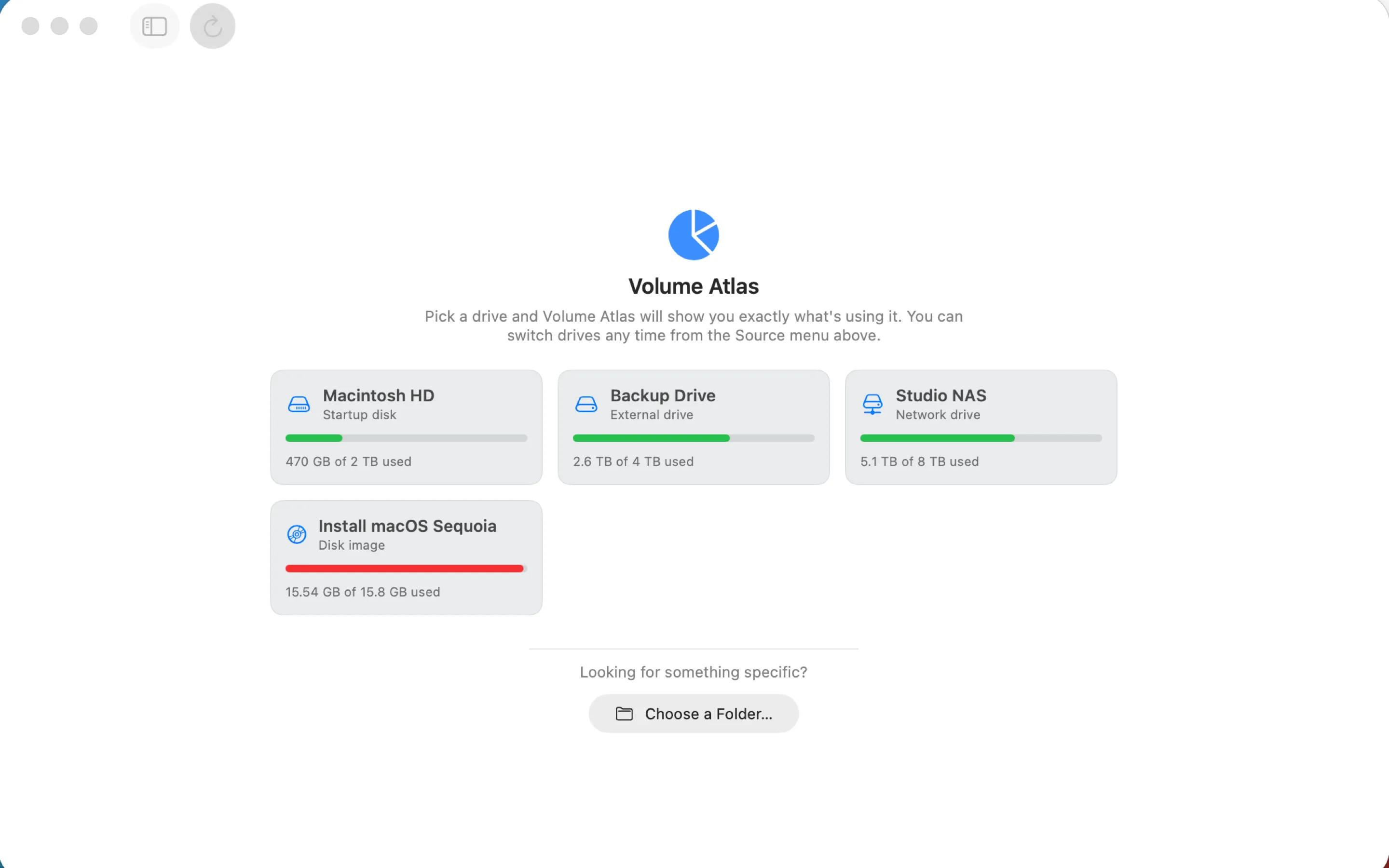 The drive picker: cards for the startup disk, an external drive, a network drive, and a disk image.